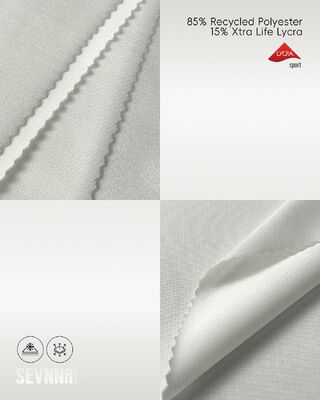 نسيج ليكرا مطاطي بـ 85% بوليستر معاد تدويره، حماية من الأشعة فوق البنفسجية، وامتصاص للرطوبة للملابس الرياضية وملابس السباحة