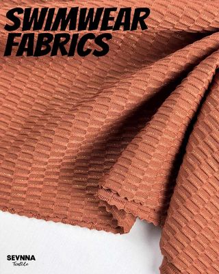 قماش سباحة فاخر الملمس بعرض 130 سم ووزن 250 جرامًا لكل متر مربع وتركيبة من النايلون المعاد تدويره لملابس السباحة عالية الأداء